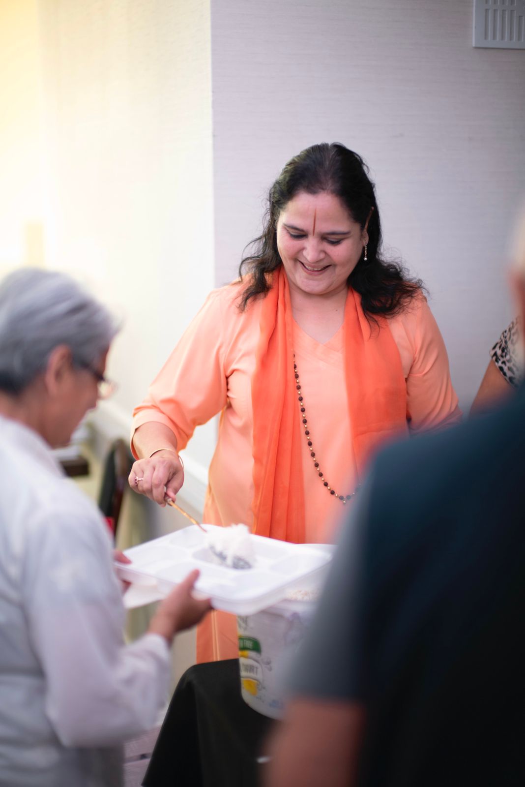 Prasad served with care after satsang